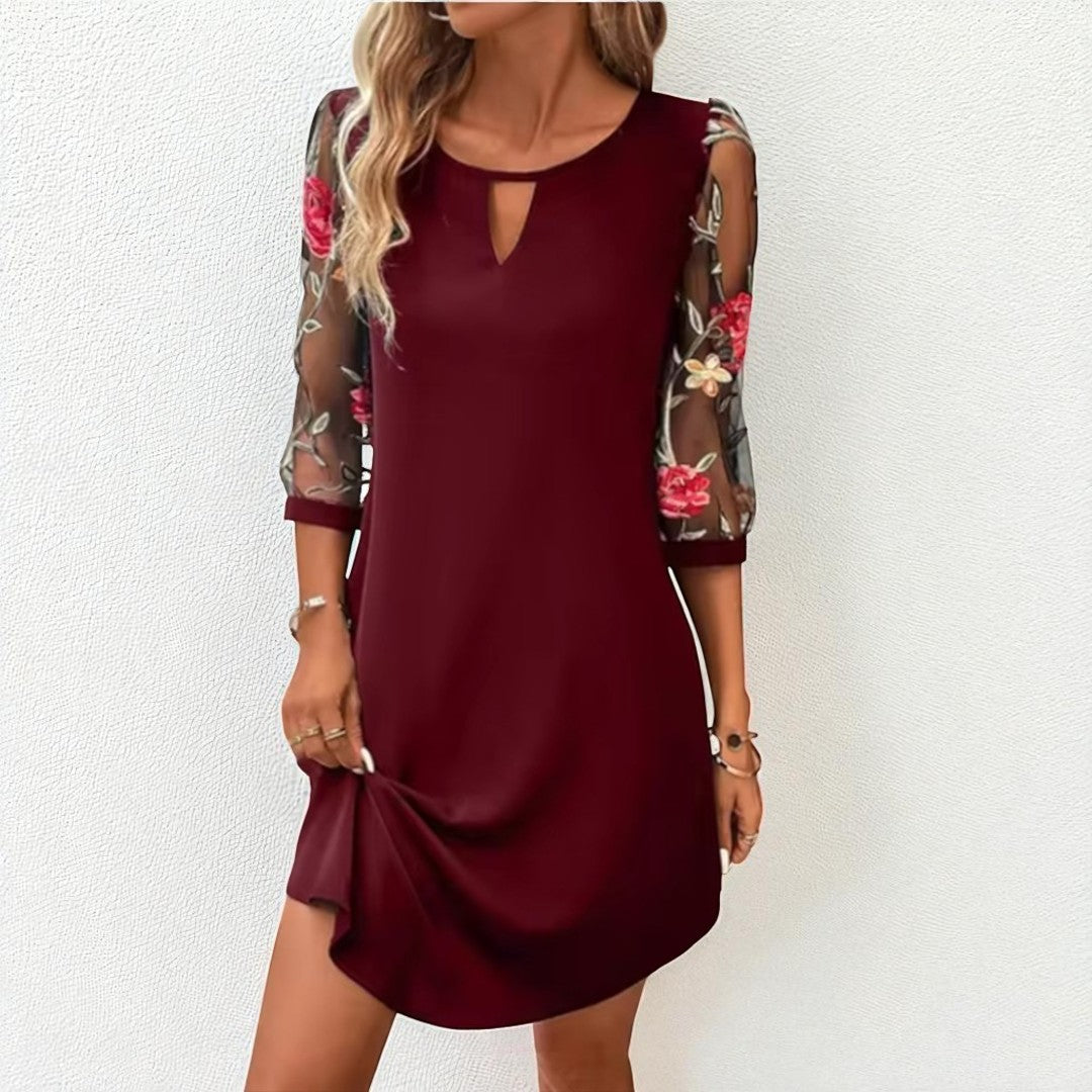 Diana Bordeaux™ | Elegant mini dress with a V-neckline and transparent sleeves