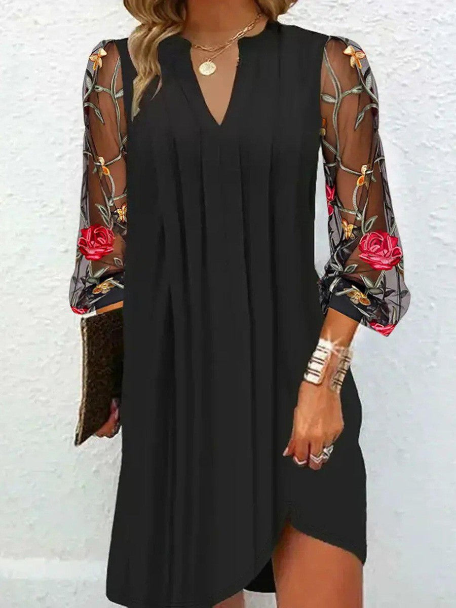 Diana Noir™ | Elegant mini dress with a V-shaped neckline and sheer sleeves